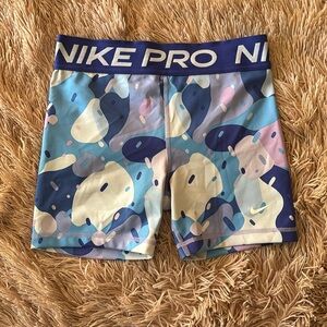 Purple and Blue Nike Pros 5”